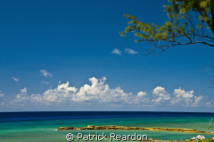 Looking North from Conch Point, Grand Cayman, at mid-day.... by Patrick Reardon 
